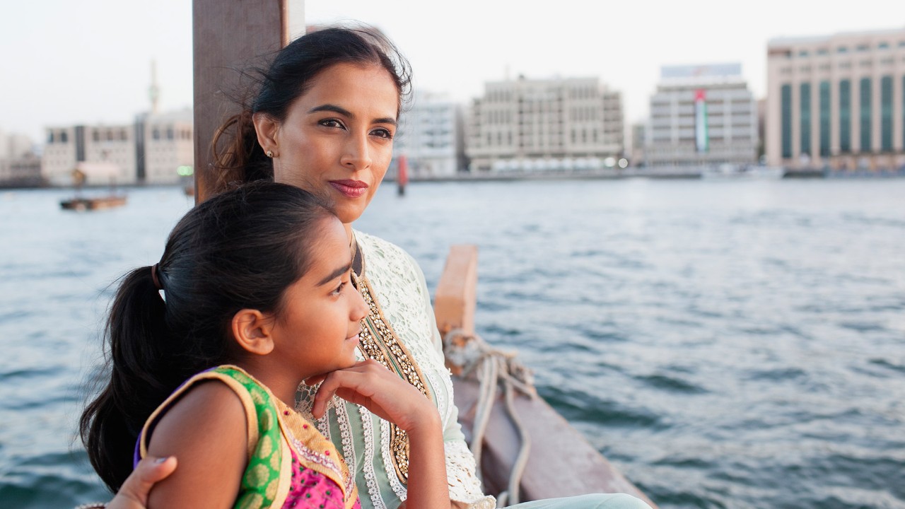 Mother and daughter are enjoying the river view; image used for HSBC Malaysia spend wi